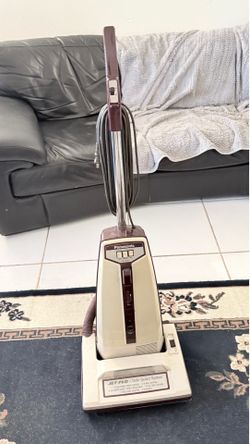Free Panasonic, Vacuum Cleaner Used   Includes hose and six bags