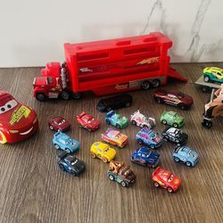 Disney Pixar Cars Mack Mini Racers Hauler and a collection of various mini racer vehicles