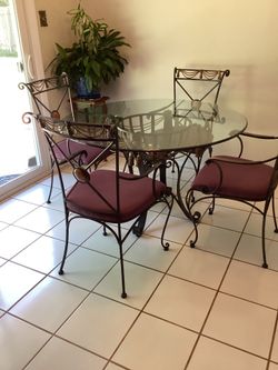 48” Glass dining table with 4 chairs