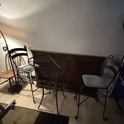 Bistro table, exercise bike, solo barstool, fans 