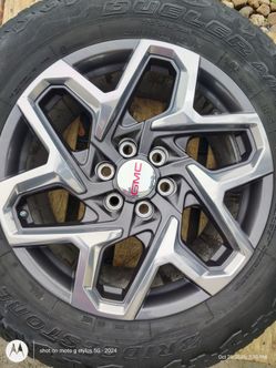 20" factory gmc wheels and used tires only 800.00  for the set