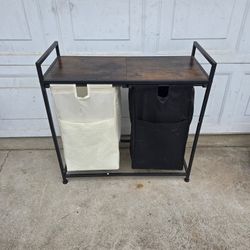 Dual hamper with sliding shelfs