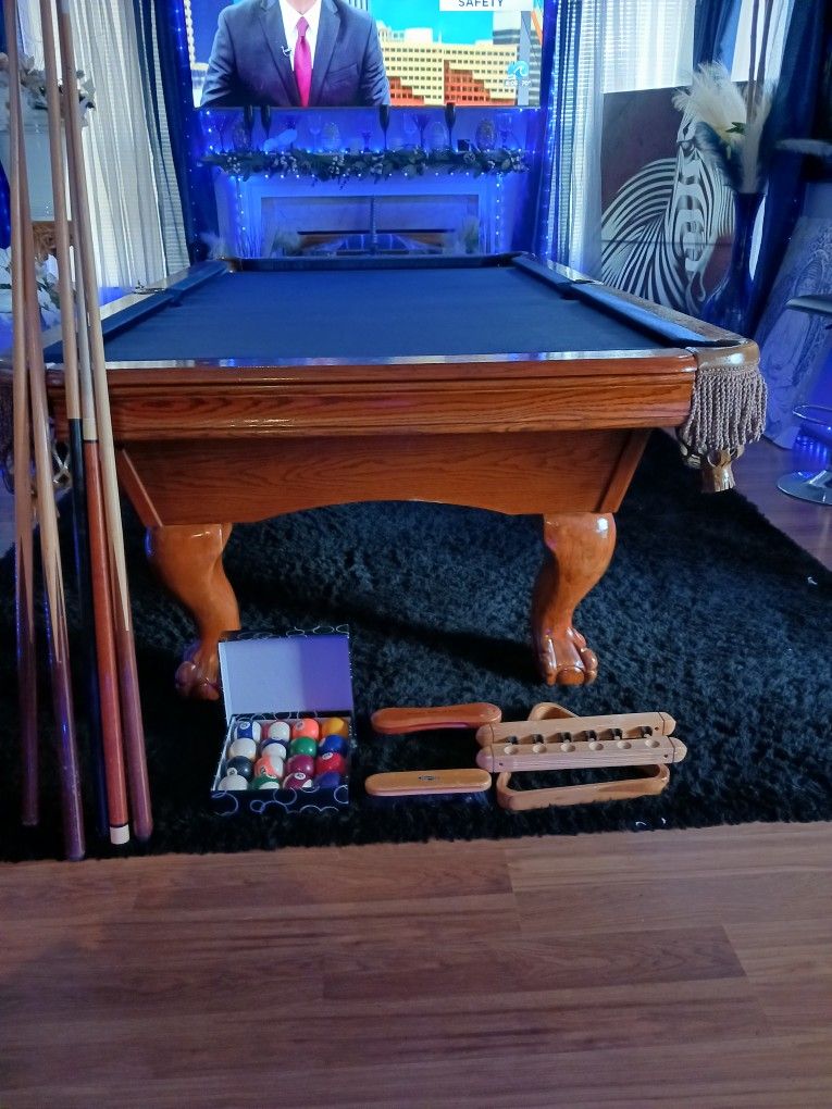 8ft.  Slate Pooltable  $500