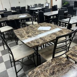 Dinettes and four chairs for 499