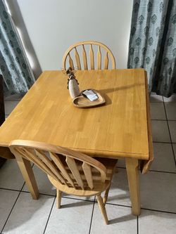 Solid light wood dining table