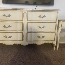 Dixie  “A beautiful antique dresser with mirror and a piece of nightstand