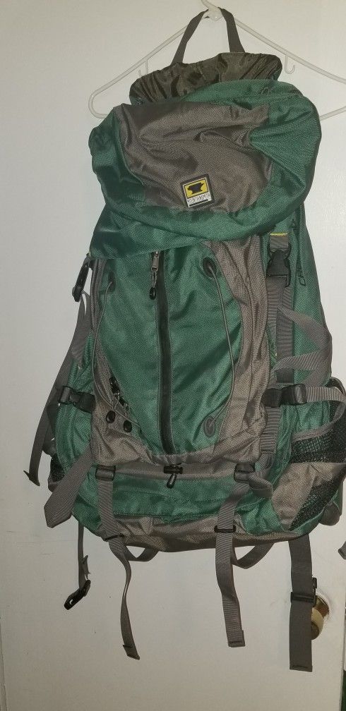 Hiking backpack like new and timberland jacket 