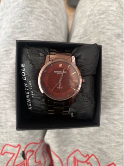 This brown stainless steel Kenneth Cole New York analog watch
