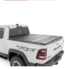 ROUGH COUNTRY Hard low profile bed cover 5’7” bed no rambox  for Ram 1500 (19-23) and TRX (21-23)