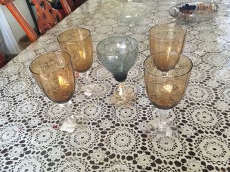 Five glasses four tan one gray for only 9.99$