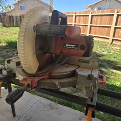 Chop saw 12" with stand. Works great.