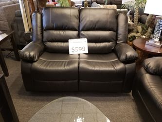 Brand new reclining loveseat