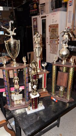4 soccer trophies