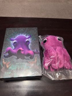 Cosmoctopus board game with octopus plushie