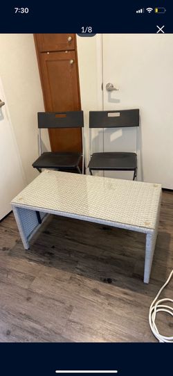 Table with glass and 2 chairs