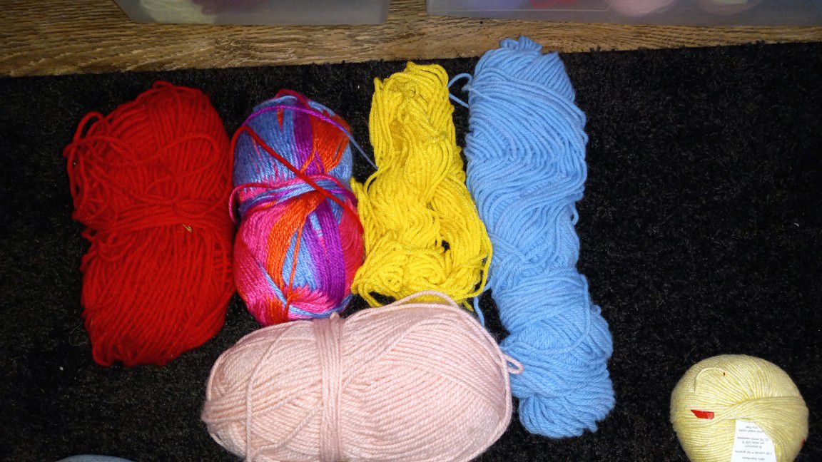 Knitting lots of yarn.  Over 50 packages.  Also include Knitting patterns and other items. 60.00 for