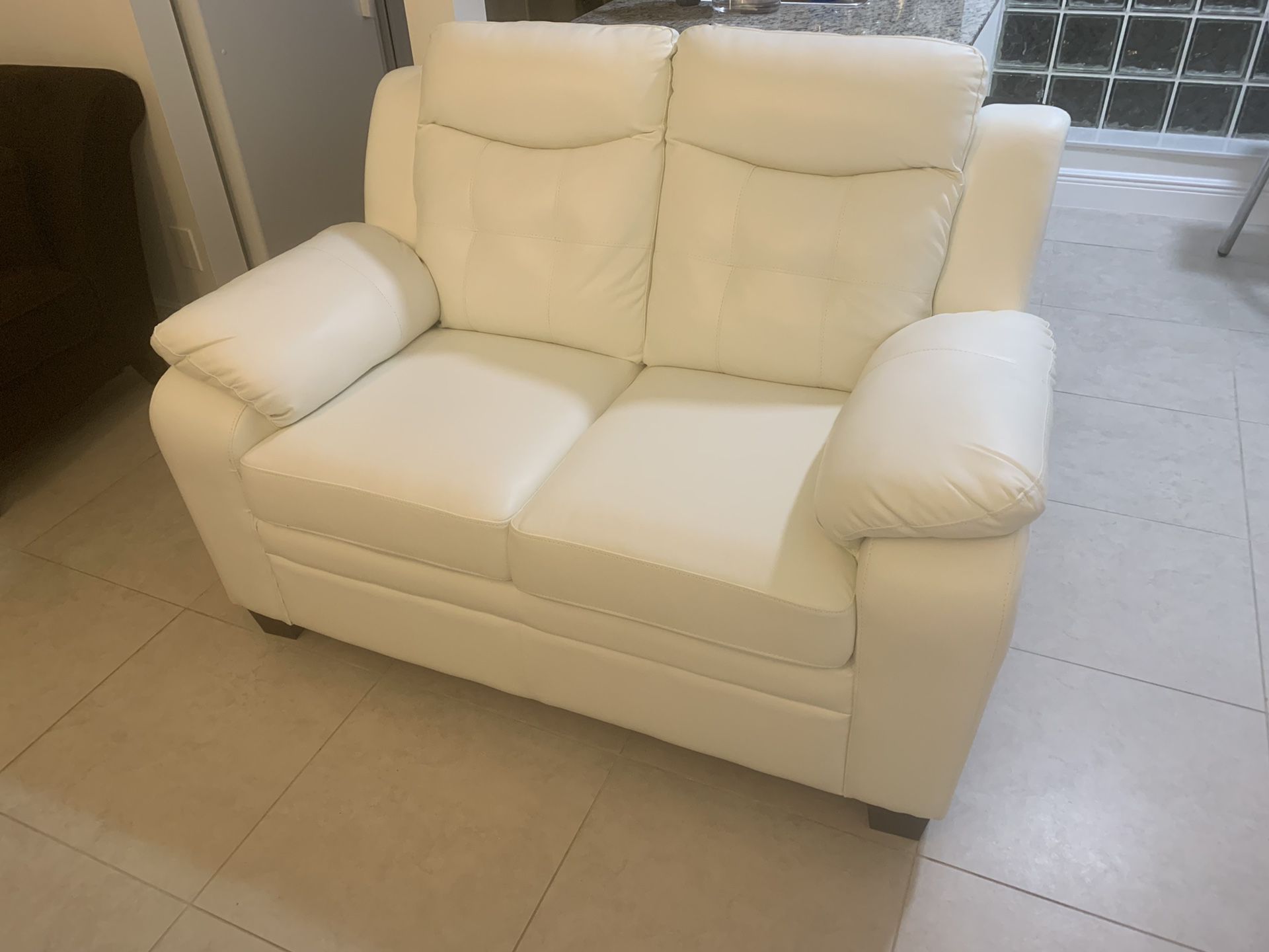 Brand new White leather couch with Purchase Receipt 6 months ago