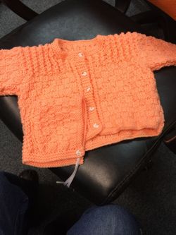 Hand made baby sweatshirt for 4 to 5 month with and made hat.