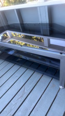 Glass and Metal Tv stand with Lower two Shelf