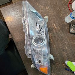 2010 Front Left Side Headlight $60