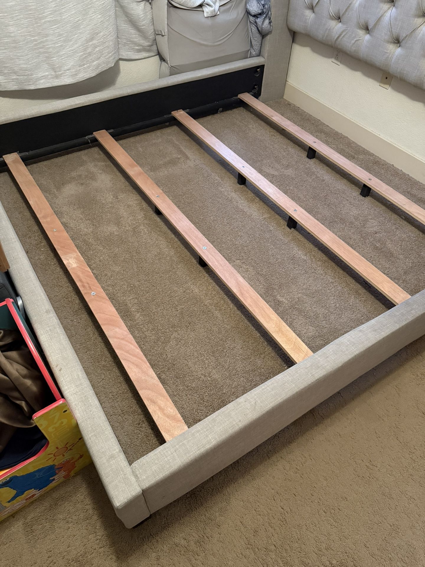 King Size Bed Frame with slot framing and cushioned Headboard.