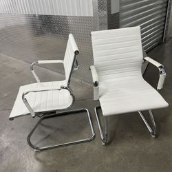 Pair White Rocking Chairs