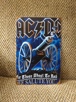 AC DC METAL SIGN.  12" X 8".  NEW.  PICKUP ONLY.