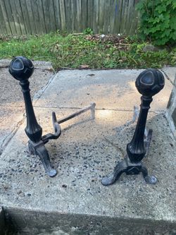 Antique iron fireplace, log racks