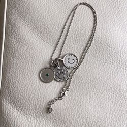 Necklace with 3 disc charms and a crystal charm