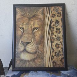 "Beautiful framed lion artwork, inspired by African themes.
