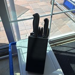 J .A. HENCKELS international  stainless  steel  knives  mising  one