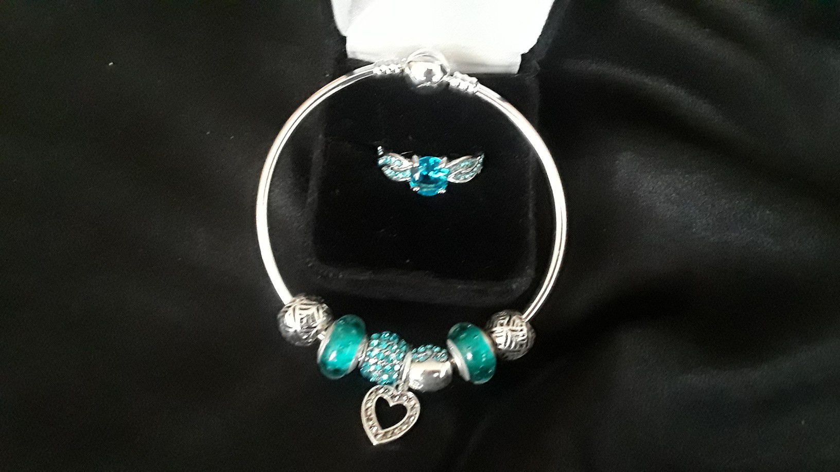 Turquoise sapphire ring w/blue charm bra