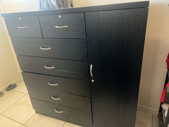 Black Dresser with Drawers and Cabinet Door