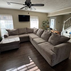 L-Shaped sectional couch with a Chasity lounge