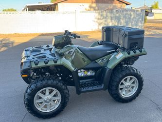 Polaris sportsman like new 200miles