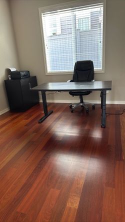 Height-Adjustable Desk with Built-In Power & Surge Protection