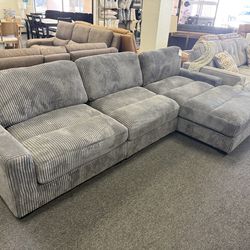 Sectional in grey corduroy