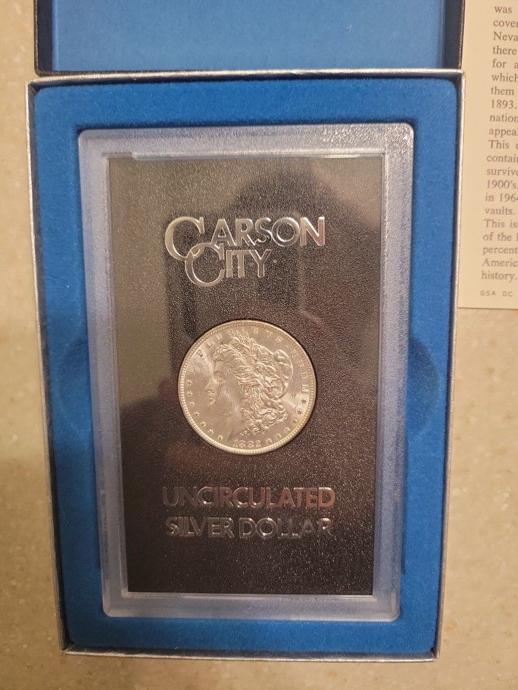 1882 CC Morgan Silver Dollar. Uncirculated With Original Box And COA