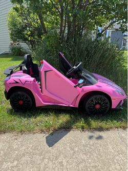 Kids Lamborghini ride on toy with lights, Bluetooth music and remote