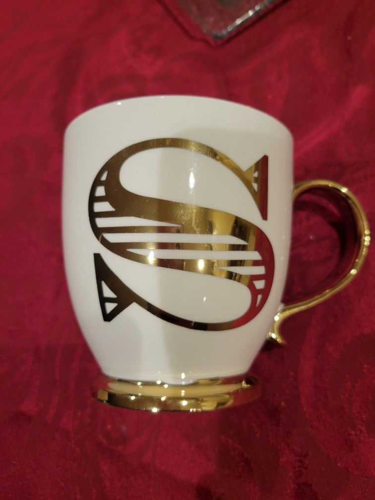 Porcelain With Gold monogram coffee cup with the letter S.
