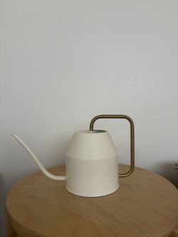 ikea white and gold watering can
