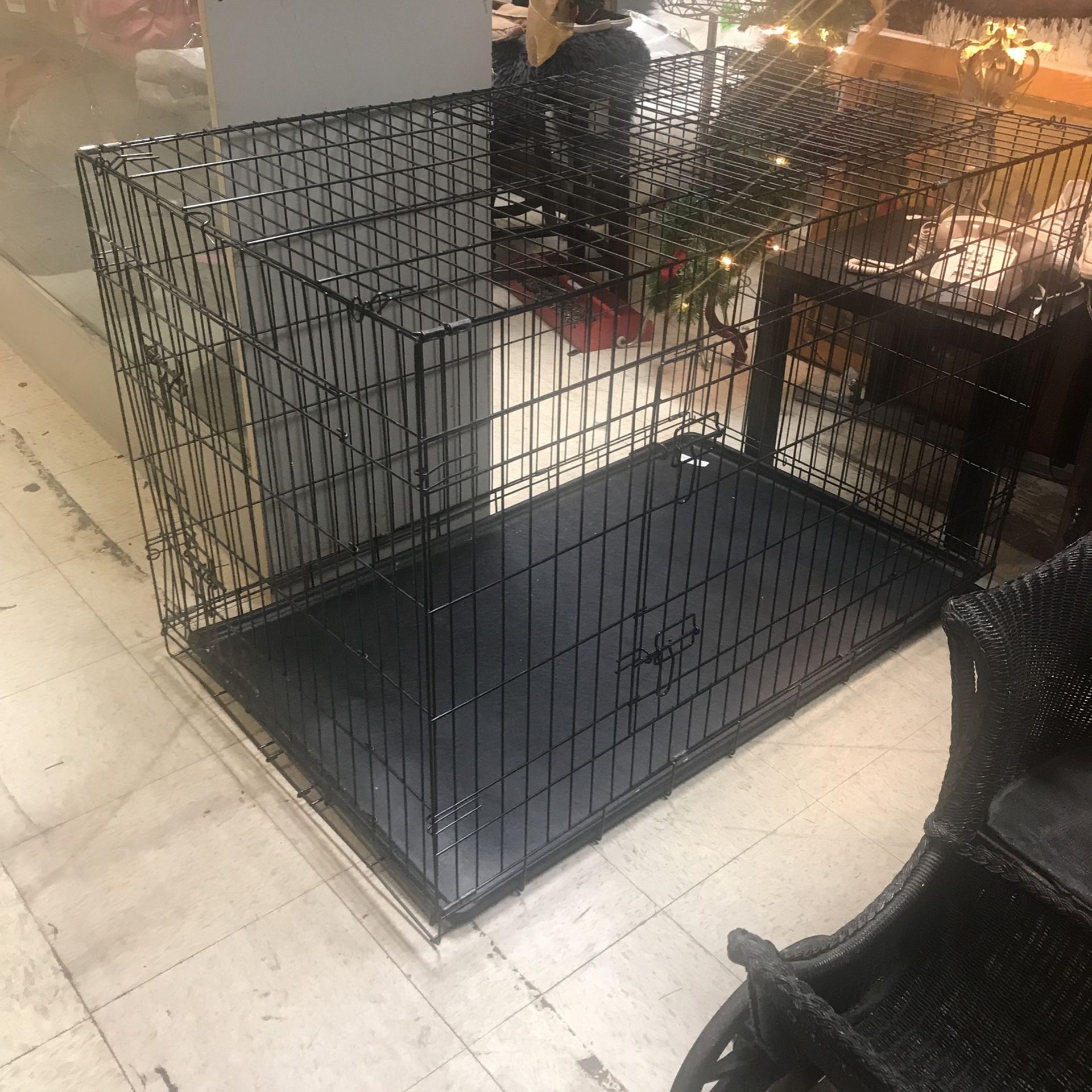 2 1/2 feet wide 2 1/2 feet tal tall and 4 feet long black large dog cage with tray