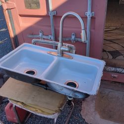 Nice Dual Sink With Moen Faucet With Spray Nozzle. Including The Piping.