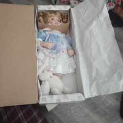 Amanda Holding Porcelain Doll