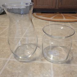 Two clear glass vases