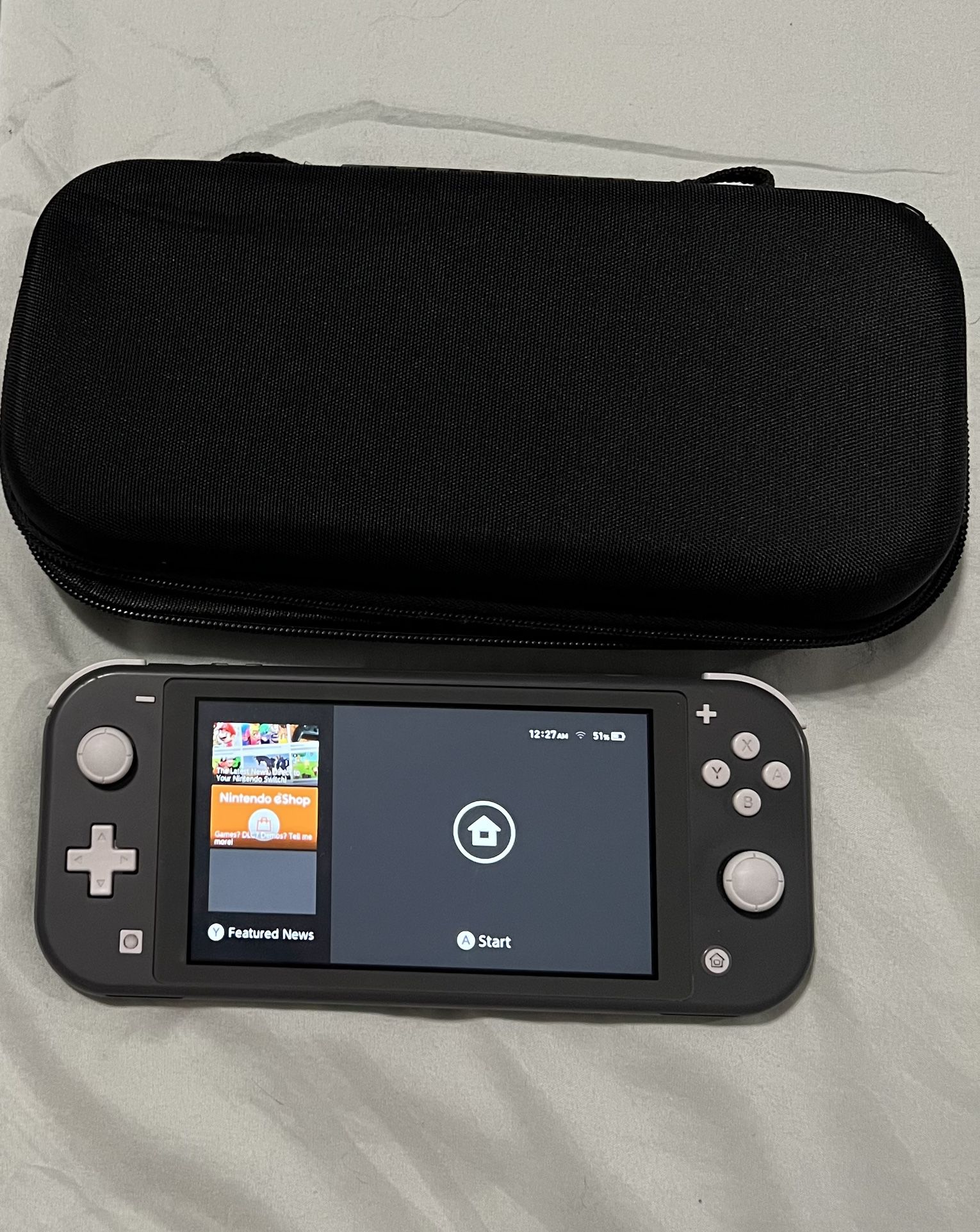 Nintendo Switch Lite, 4 Games, And Carrying Case