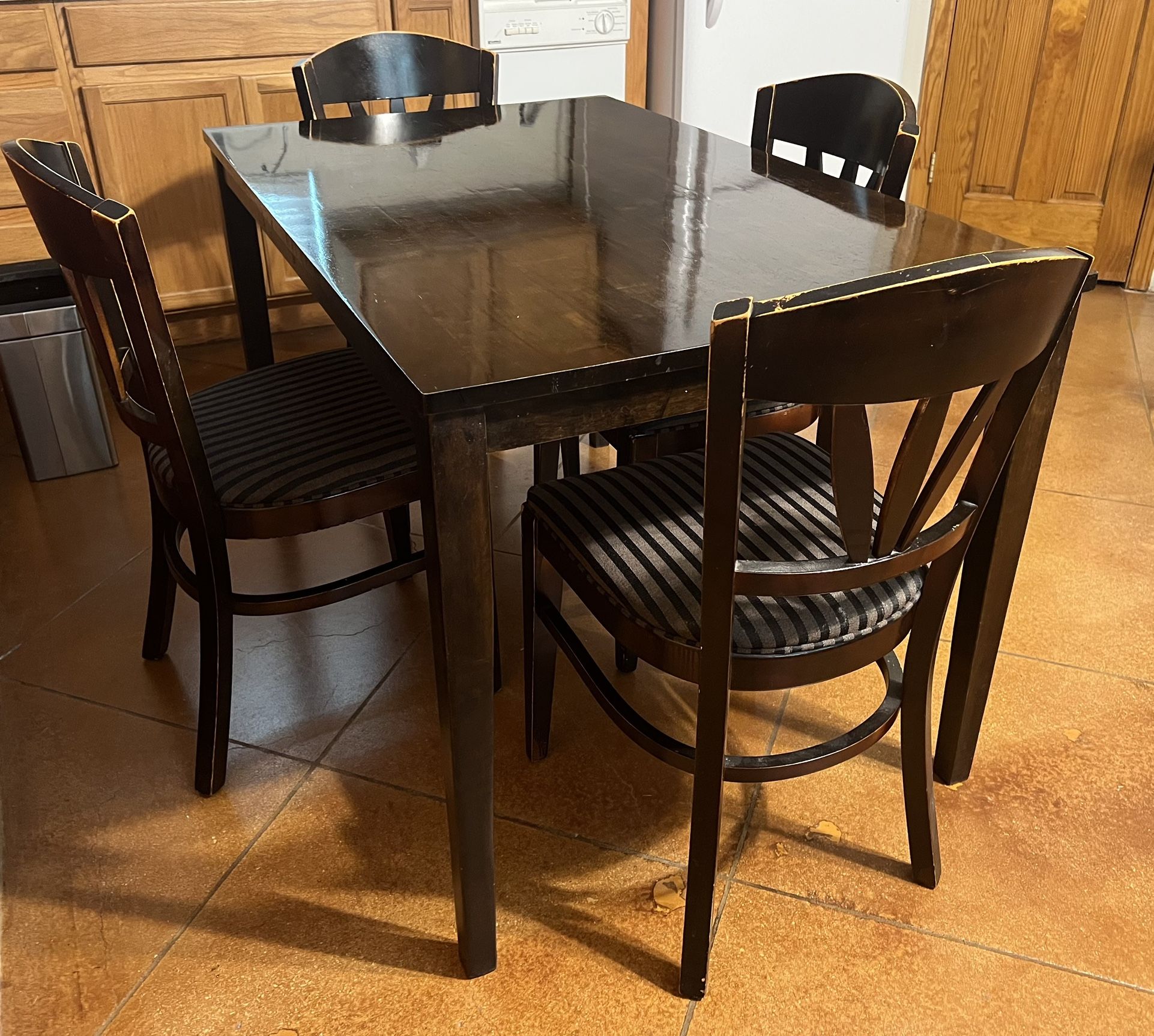 Used All Wood Table And Four Chairs
