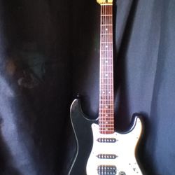 Squier By Fender Electric Guitar 