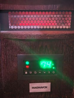 Magnavox Infrared Heater featuring a wooden cabinet.
