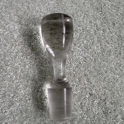 Crystal clear, glass stopper used for decanters, perfume bottles, or cruets with teardrop design